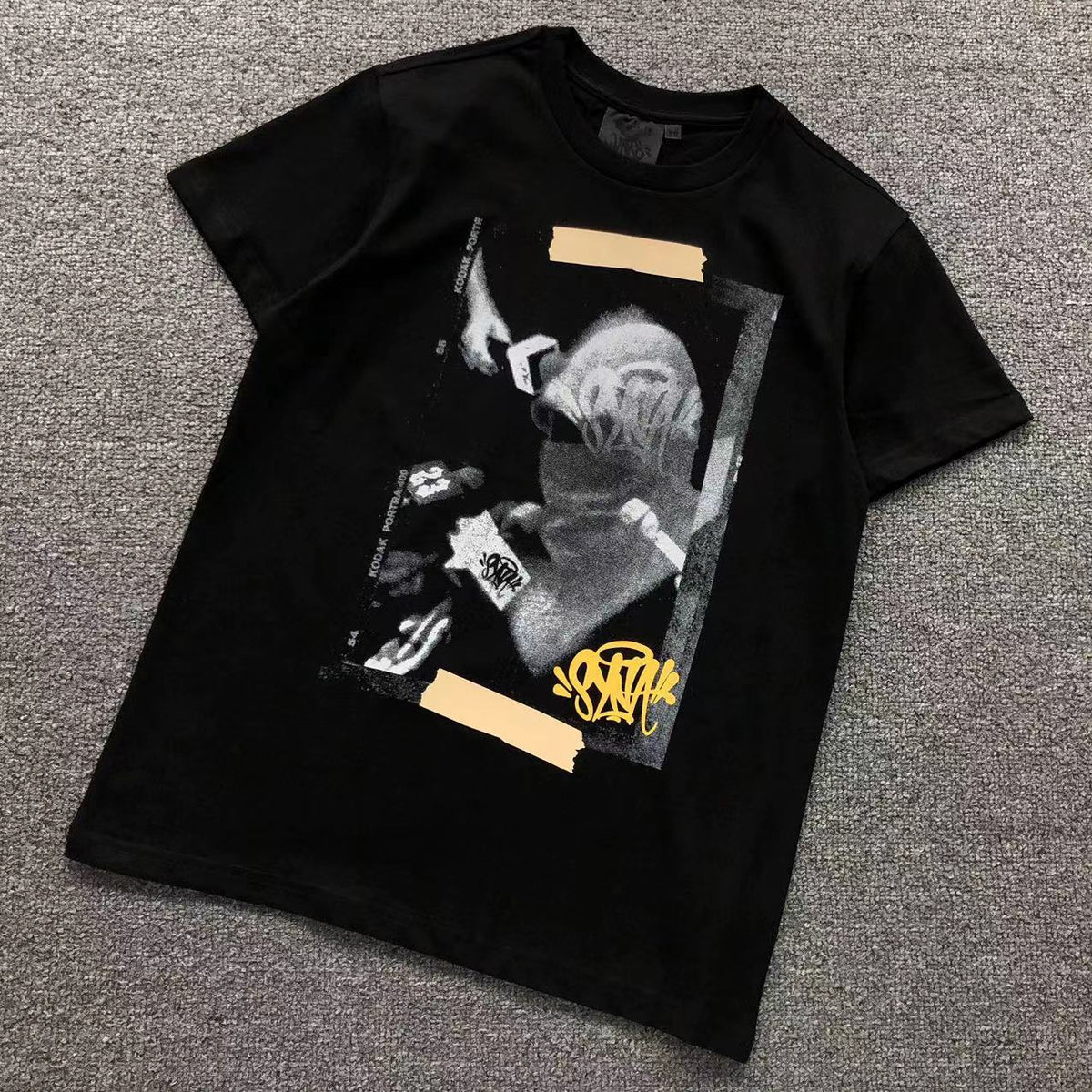 Camisa Syna World Kodak Tape Collage — peito