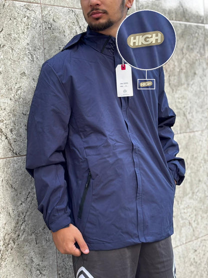 Casaco Corta Vento Impermeavel Storm PRO 2026 Marinho com patch High Resina Oval Bege