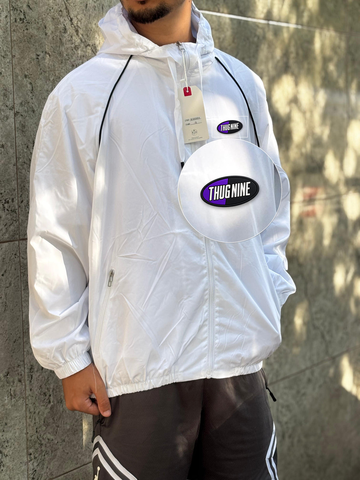 Casaco Corta Vento Importado Alpine North 2026 Branco com patch Thug Nine Oval Preto Com Roxo