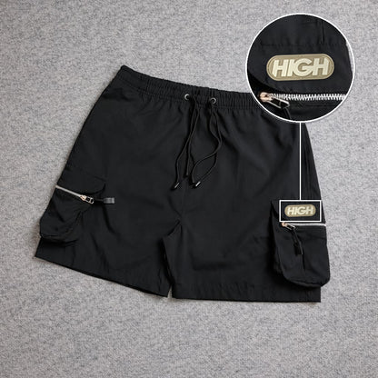 SHORT CARGO BOLSO MOCHILA COM ZÍPER PRETO com patch High Resina Oval Bege