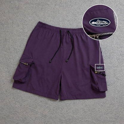 SHORT CARGO BOLSO MOCHILA COM ZÍPER ROXO com patch Cortez Prisao