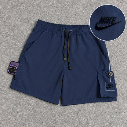 Short Cargo Elastano Tech Azul Marinho com patch Nike Escrita Sp Preto