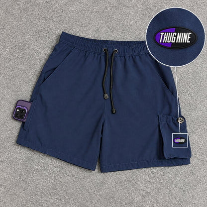 Short Cargo Elastano Tech Azul Marinho com patch Thug Nine Oval Preto Com Roxo