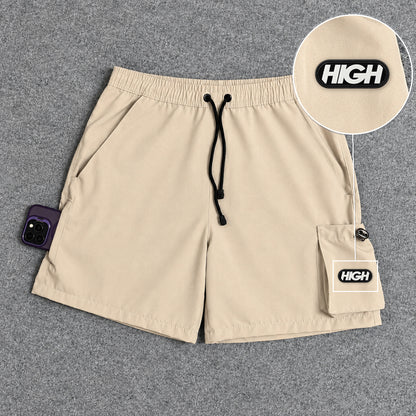 Short Cargo Elastano Tech Bege com patch High Resina Oval Preta