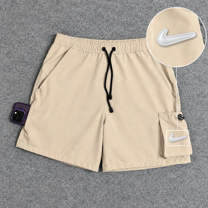Short Cargo Elastano Tech Bege com patch Nike Facao Sp Branca