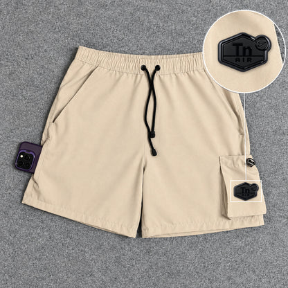 Short Cargo Elastano Tech Bege com patch Tn Resinado Preto