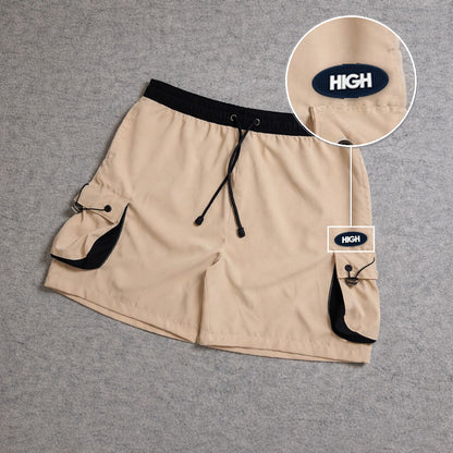 SHORT CARGO FOLLER COM REGULADOR BEGE com patch High Oval