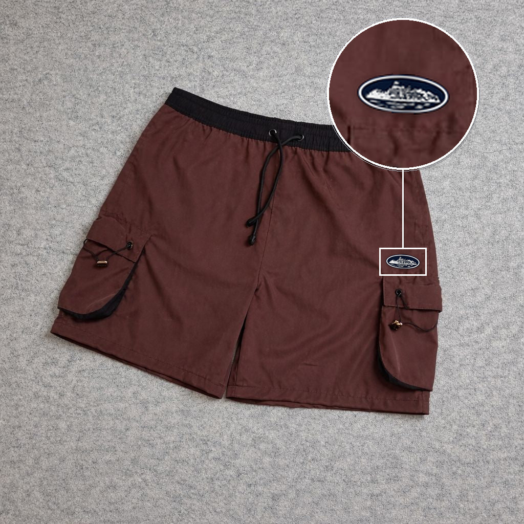SHORT CARGO FOLLER COM REGULADOR MARROM com patch Cortez Prisao