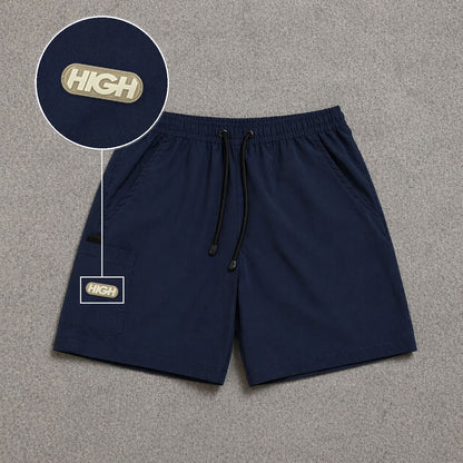 Short Cargo Street com Bolso Funcional Azul Escuro com patch High Resina Oval Bege