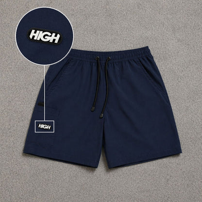 Short Cargo Street com Bolso Funcional Azul Escuro com patch High Resina Oval Preta
