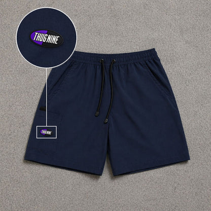 Short Cargo Street com Bolso Funcional Azul Escuro com patch Thug Nine Oval Preto Com Roxo