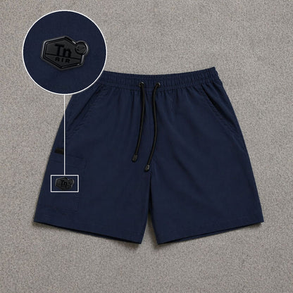 Short Cargo Street com Bolso Funcional Azul Escuro com patch Tn Resinado Preto