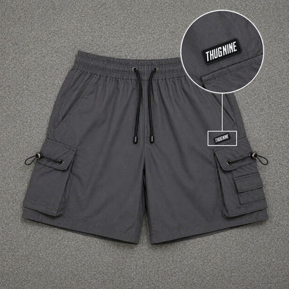 Short Cargo Streetwear Dual Pocket Cinza Chumbo com patch Thug Nine Retangular