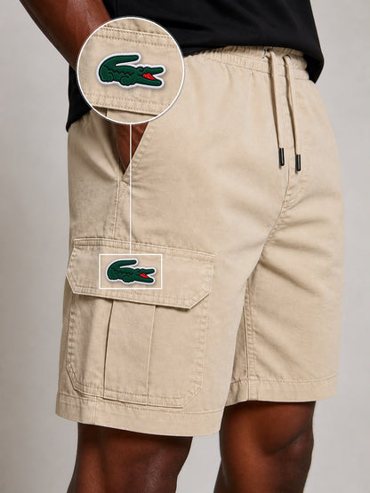 SHORT SARJA CARGO AREIA com patch Lacoste Sp