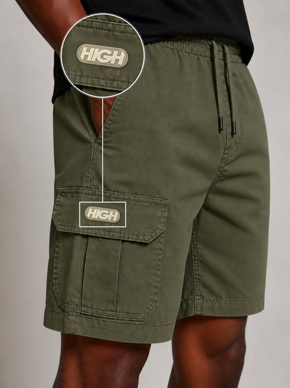 SHORT SARJA CARGO VERDE MILITAR com patch High Resina Oval Bege