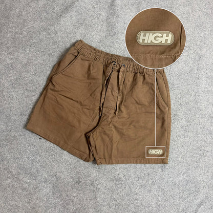 SHORT SARJA MAURICINHO CAQUI com patch High Resina Oval Bege